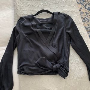 Black satin material long sleeve tie front blouse